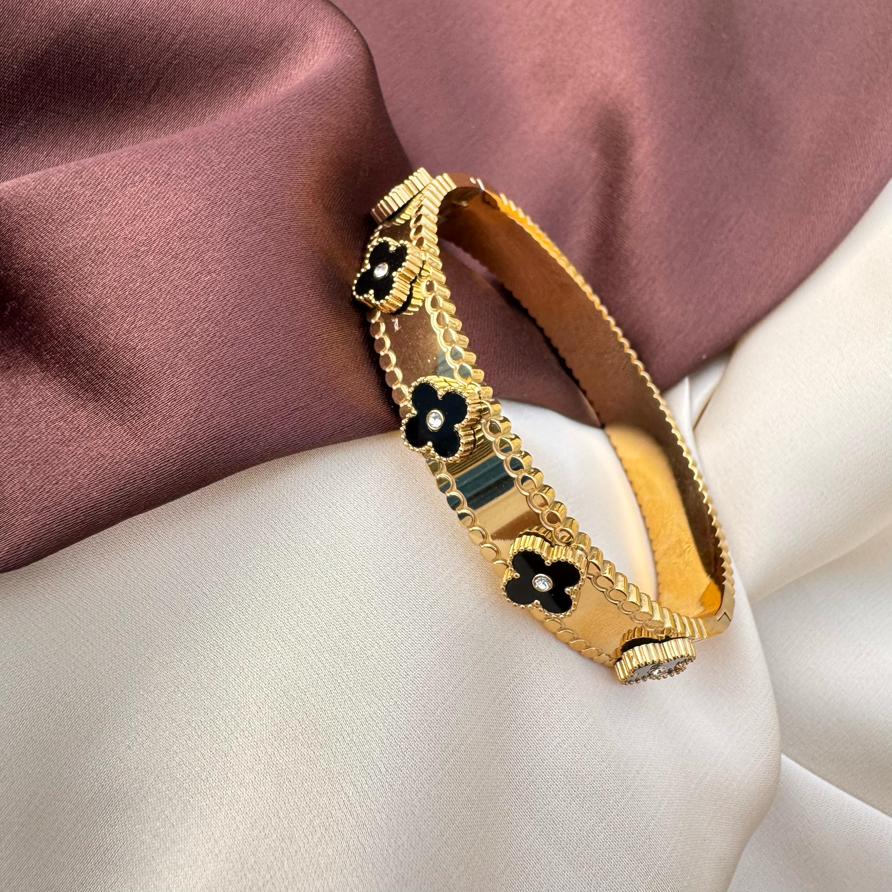 TFC  Size 2.6 Black Gemcrest Gold Plated Bracelet Bangle