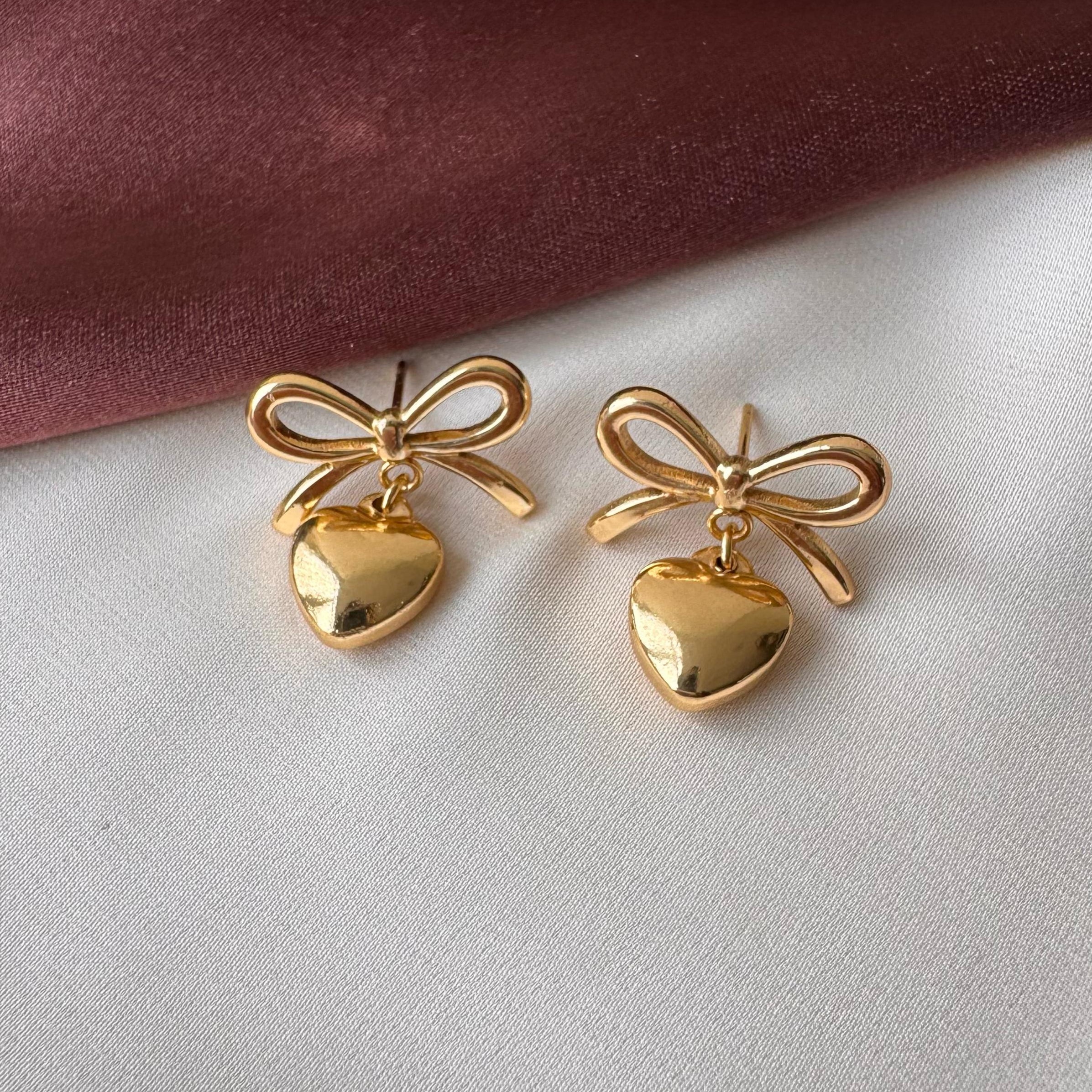 TFC Bow Heart Gold Plated Dangler Earrings