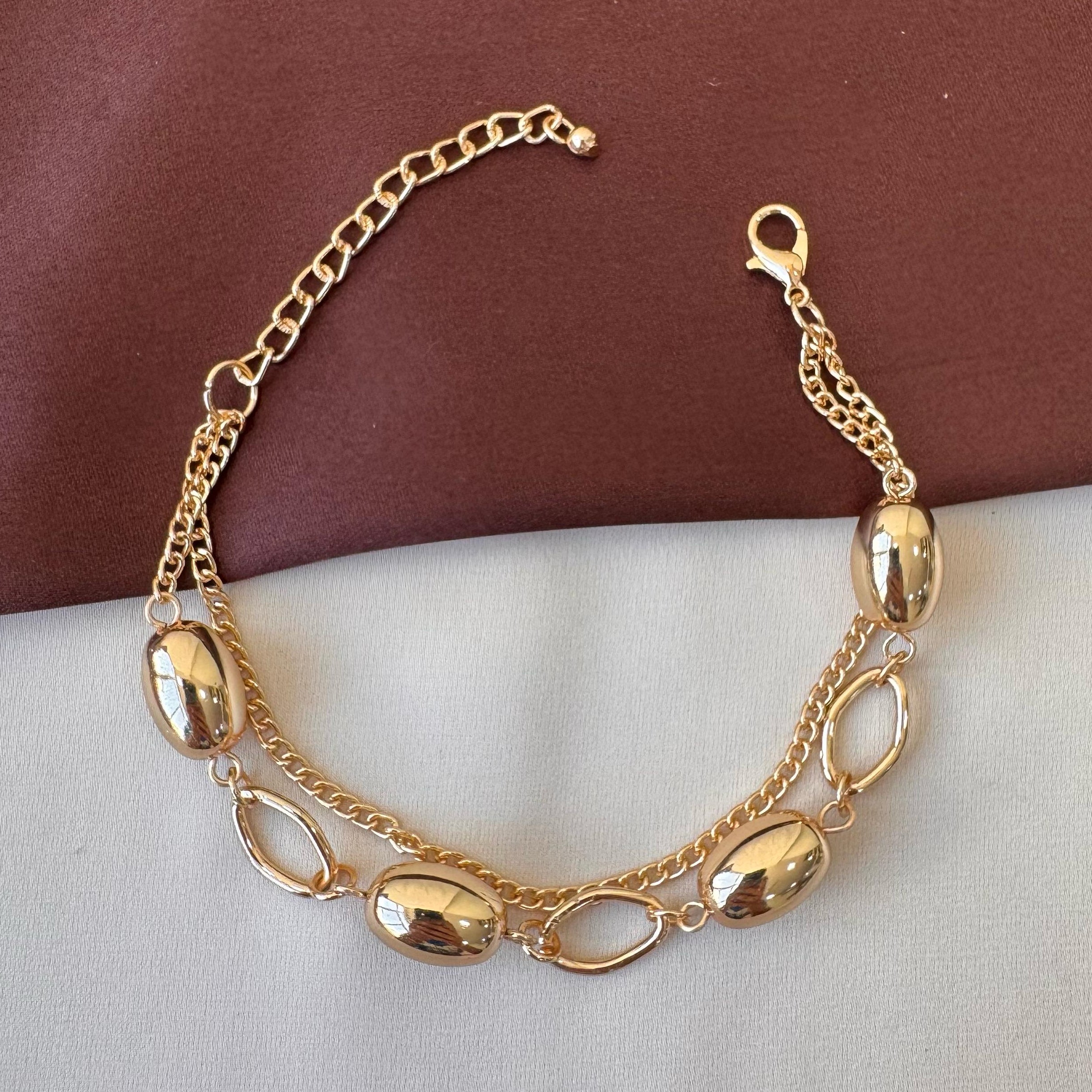 TFC Hollow Oval Charms Gold Plated Bracelet