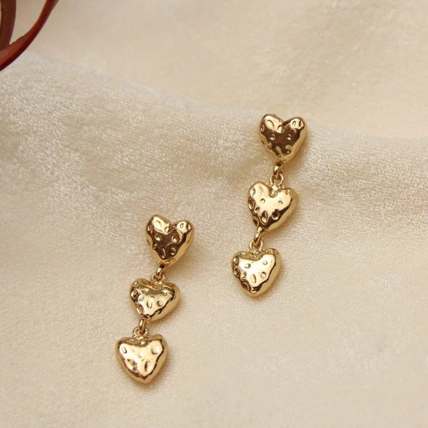 TFC Triple Heart String Gold Plated Dangler Earrings